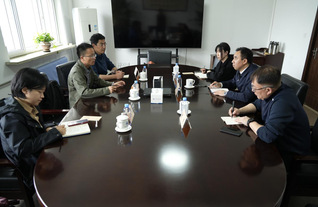 校长杜明会见华大集团代表一行